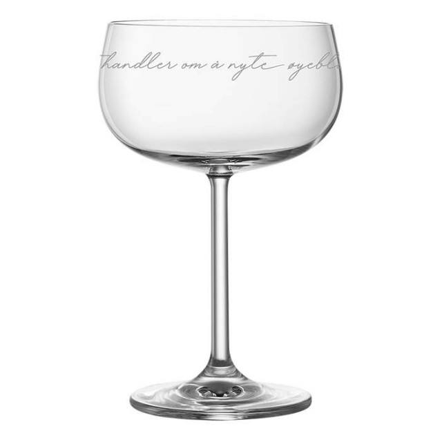 Champagneglass fra Lykketegning tekst: det handler om å nyte øyeblikket